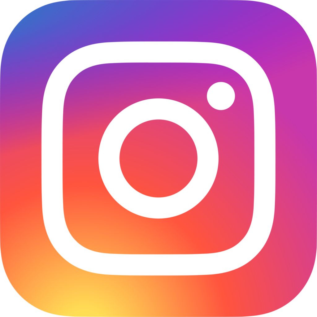 White camera icon on top of an ombe blue, purple, and organge background